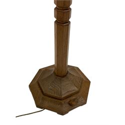 'Mouseman' oak standard lamp with shade, octagonal tapered column on stepped moulded base carved with mouse signature, by Robert Thompson of Kilburn