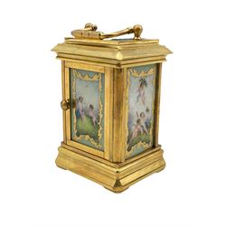 A contemporary miniature carriage clock with Sevres style porcelain panels, timepiece movement with a platform lever escapement, clock in a gilt case, with a white dial with Roman numerals, minute markers and steel moon hands, subsidiary day and date dials, with bevelled glass panels to the case and a rectangular glass panel to the top of the case. With Key.