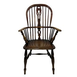 Windsor chair, the pierced splat and spindle hooped back over saddle seat, raised on turned supports, united by a stretcher W62cm 