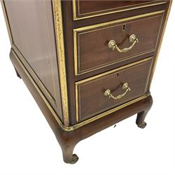 Edwardian walnut twin pedestal writing desk, moulded reverse break-front top with raised gallery and leather inset, fitted with nine drawers, brass stringing and edge mouldings throughout the top and drawer fronts, on tapering feet with brass castors 