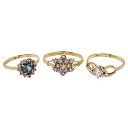 Gold cubic zirconia cluster ring, heart shaped blue cubic zirconia ring and one other, all hallmarked 9ct