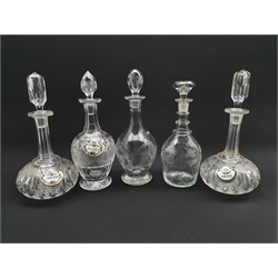 Pair of etched glass Sherry decanters with bone china labels, hobnail cut glass decanter and two other decanters