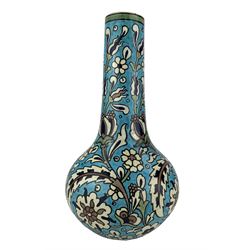 Burmantofts Faience Anglo-Persian vase, designed by Leonard King, of bottle form, painted with stylized flowers and foliage against a blue ground, impressed factory marks, model no. 36, incised 'Design 65, 362' and artists monogram LK, H35cm