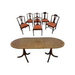 20th century mahogany regency design twin pillar dining table together with a set of six dining chairs