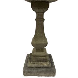 Victorian design cast stone garden bird bath, shallow dished top over stepped and turned square pedestal
