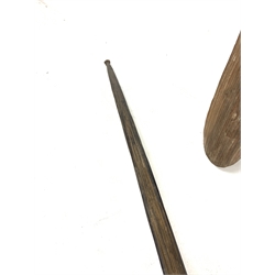 20th century Australian Aboriginal parrying shield of elongated oval form carved with geometric fluting and single integral grip, together with a tribal bow, L161