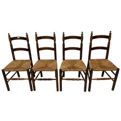Set four late 19th century country elm dining chairs, ladder backs with turned supports and rush seats 