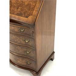 Reprodux figured walnut serpentine bureau, the crossbanded fall front revealing interior fitted with cubby holes and tooled leateher writing surface, over four cock beaded drawers, raised on shaped bracket supports, W53cm, H95cm, D43cm