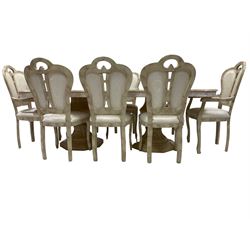 Italian composite marble extending dining table, serpentine top in onyx beige finish with gilt scrolling design, supported by twin pedestals in a neo-classical urn style (230cm x 104cm x 76cm); Set eight (4+2) composite marble dining chairs, arched cresting rail with upholstered back and seat decorated with cream foliate pattern (55cm x 56cm x 106cm)