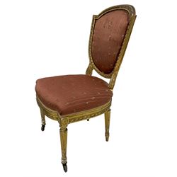 Late 19th century giltwood and gesso bedroom chair, the upholstered back with stepped arch cresting rail and ribbon twist moulding, upholstered seat, turned and fluted supports on castors