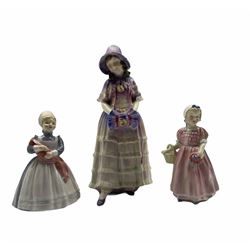 Royal Doulton figure 'Estelle' HN1566 withdrawn 1938 (restored) , another 'The Rag Doll' HN2142 and 'Tinkle Bell' HN1677 (3)