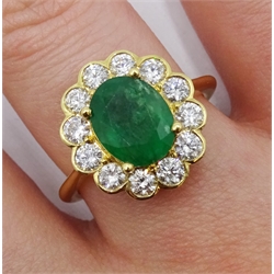 18ct gold oval emerald and diamond cluster ring, hallmarked, emerald approx 1.60 carat, diamond total weight approx 0.85 carat