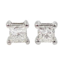 Pair of 18ct white gold princess cut diamond stud earrings, stamped 750, total diamond weight approx 0.55 carat