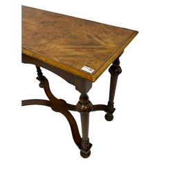 Late 19th century oak and walnut side table, moulded rectangular top with figured and match veneer, on turned supports united by shaped X-frame stretchers, on turned feet
Provenance: From the Estate of the late Dowager Lady St Oswald