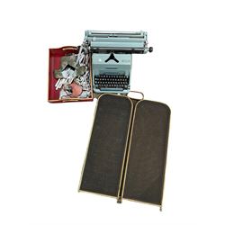 Folding brass spark guard, Imperial 70 manual office typewriter and a lacquer tray containing cutlery 