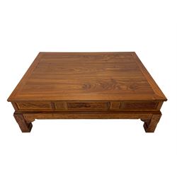 Chinese Imperial style hardwood throne room rectangular tea table, panelled rectangular form, carved with foliate motifs and trailing geometric patterns, on square supports
