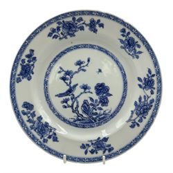 18th century Chinese Export blue and white plate, centrally decorated with an exotic bird on a blossoming tree, within a floral and geometric patterned border, D23cm