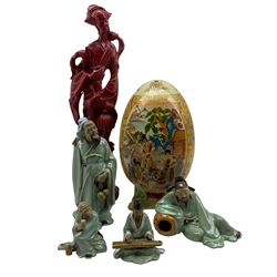 Japanese Satsuma Egg decorated with domestic scenes and gilt on feet, four Chinese ceramic 'Mud Men' figures, red resin statuette of a Geisha (6)