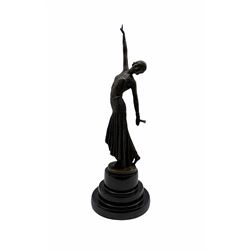 After Demetre Chiparus (1886-1947), an Art Deco style bronze, modelled as a female figure, signed and with foundry mark, raised upon a circular stepped base, overall H38cm