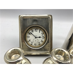 Silver challenge mug with inscription H12cm London 1899, large pocket watch in silver travelling case Birmingham 1912, four silver dressing table candlesticks, silver hand mirror and brush 