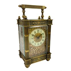 French - Pair of Edwardian 8-day timepiece carriage clocks with bevelled rectangular glass panels and overlaid friezes in gilt repousse work with fretted dial masks, enamel chapter ring with Arabic numerals and steel spade hands, both clocks with single train movements, one movement with a jewelled cylinder platform escapement and the other with a jewelled and silvered lever platform escapement.
No Keys.