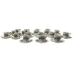 Set of twelve Wedgwood 'Devon Sprays' coffee cans and saucers, together with a similar set of six Cresent & Sons coffee cups and saucers 