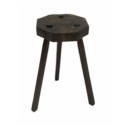 Primitive burr walnut stool, the octagonal top raised on three square section supports H60cm