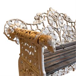 Coalbrookdale - 19th century oak and ivy pattern cast iron garden benches, the open back decorated with trailing oak and ivy leaves, oak slatted seat, the rolled arms with hound mask terminals, on splayed and scrolled supports