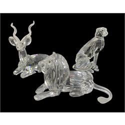 Two Swarovski crystal SCS Annual Edition 'Inspiration Africa' figures comprising Kudu - 1994 and Lion 1995, together with a Swarovski crystal Cheetah, all boxed