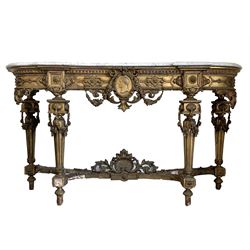 19th century French ornate gilt wood and gesso console table, the moulded white variegated marble top over applied egg and dart and floral decoration to frieze centred  by a roundel depicting Napoleon issuing floral swags and acanthus leaf, raised on turned fluted supports united by shaped stretcher with shell and acanthus leaves W169cm, H94cm, D51cm