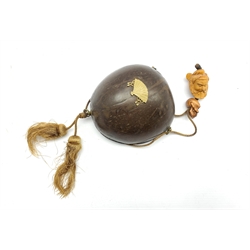 19th century Japanese coconut shell box and cover with lacquer finish, three brass ring fitting with attached cord, applied fan shaped mount and two later carved wooden ojime beads,  L13cm x H9cm 