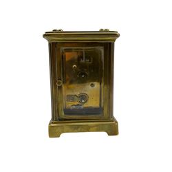 Late 19th century French carriage clock with a timepiece movement and replacement lever platform escapement, enamel dial with Roman numerals and non-matching steel hands.