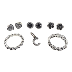 Silver flower ring and cubic zirconia eternity ring and three pairs of earrings, all by Pandora, Thomas Sabo silver cubic zirconia ring and heart pendant, pair of silver skull earrings, silver and stone set silver rings, earrings, bracelets and pendants, all stamped (18)