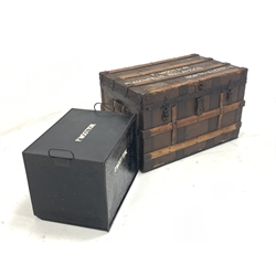 Early 20th century canvas covered and metal and wooden bound travelling trunk, painted with the name 'F. Wootton' together with a black japanned deed box, with carry handles, compartmentalised interior, painted with the name 'P. Wootton'