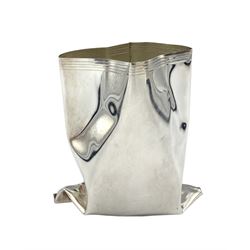 Novelty silver vase by Rebecca Joselyn modelled as a crumpled bag H8cm, hallmarked Sheffield 2013. Rebecca Joselyn studied at Sheffield Hallam University and graduated in 2006. She has won numerous awards for her 'From the Shed' and 'Packaging' collections 
