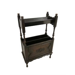 20th century oak magazine rack, the trough top raised on turned supports, main two division with moulded and carved panels