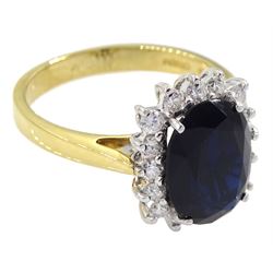 18ct gold oval sapphire and diamond cluster ring, hallmarked, sapphire approx 3.30 carat, total diamond weight approx 0.50 carat