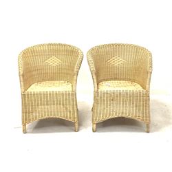 Pair of tub shaped wicker conservatory chairs W69cm together with a circular bamboo table with glass top 
