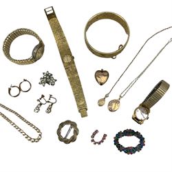 Two gold locket pendants on chains and a small quantity of costume jewellery, a lady's 18ct gold cased mechanical wristwatch on a gilt stainless steel strap and other gilt metal wristwatches