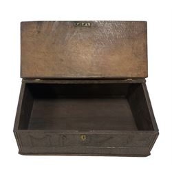 Early 18th century oak bible box, rectangular sloped hinged top with moulded edge, the front carved with initials 'MP' and dated '1714', decorated with geometric chip carving below