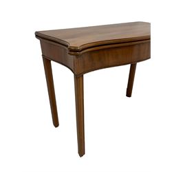 George III mahogany card table, serpentine fold-over top with extending eared corners with baize lined interior, over double gate-leg action base, raised on square moulded supports with inner chamfer
Provenance: From the Estate of the late Dowager Lady St Oswald