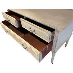 Early 20th century French dressing chest, rectangular top with egg and dart moulded lower edge, fitted with two short and one long mahogany lined drawer, raised on turned fluted supports on castors