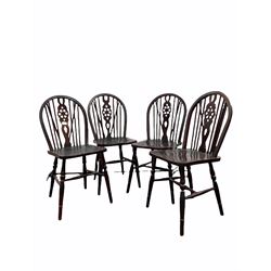 Set of four wheel back chairs with turned supports