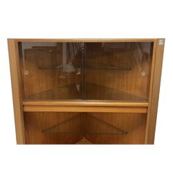 G-Plan - mid-20th century teak 'Fresco' corner cabinet (W100cm H171cm); mid-20th century teak two-tier drinks trolley, rectangular drop-leaf top over single drawer, on castors (W84cm D41cm H65cm)
