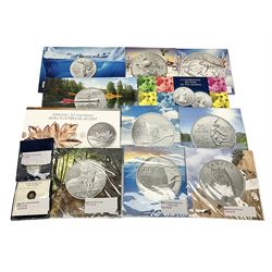 Thirteen Royal Canadian Mint fine silver twenty dollar coins, some in card folders
