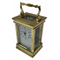 A 20th century Anglaise cased 8-day timepiece carriage clock with a seven jewelled lever platform escapement and timing screws, white enamel dial inscribed “L’Epee”, with Roman numerals, five-minute Arabic’s and minute markers, steel moon hands, bevelled glass panels to the case and a rectangular glass panel to the top of the case.    With key.   