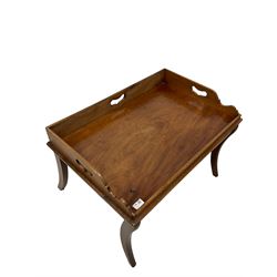 Mahogany tray-top coffee table, rectangular on splayed legs 