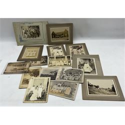 Collection of late 19th/20th century photographs of leper settlements in Madagascar, some titled to the reverse and including Rev. A S Huckett and his wife at their settlement with patients, landscapes etc approx 65 in total, various sizes