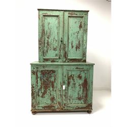19th century stained and painted pine country kitchen press, the top section fitted with two panelled doors enclosing three shelves, two panelled doors enclosing two shelves under, raised on compressed bun supports W109cm, H186cm, D47cm