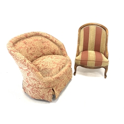 Early 20th century tub shaped upholstered chair, raised on turned oak supports with brass castors, (W84cm) together with a stained beech framed upholstered bedroom chair (W57cm)